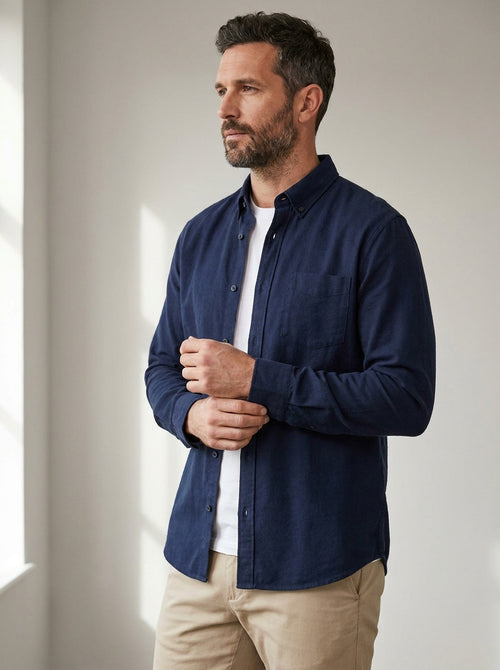 relaxed casual button-down shirt in navy — angle view